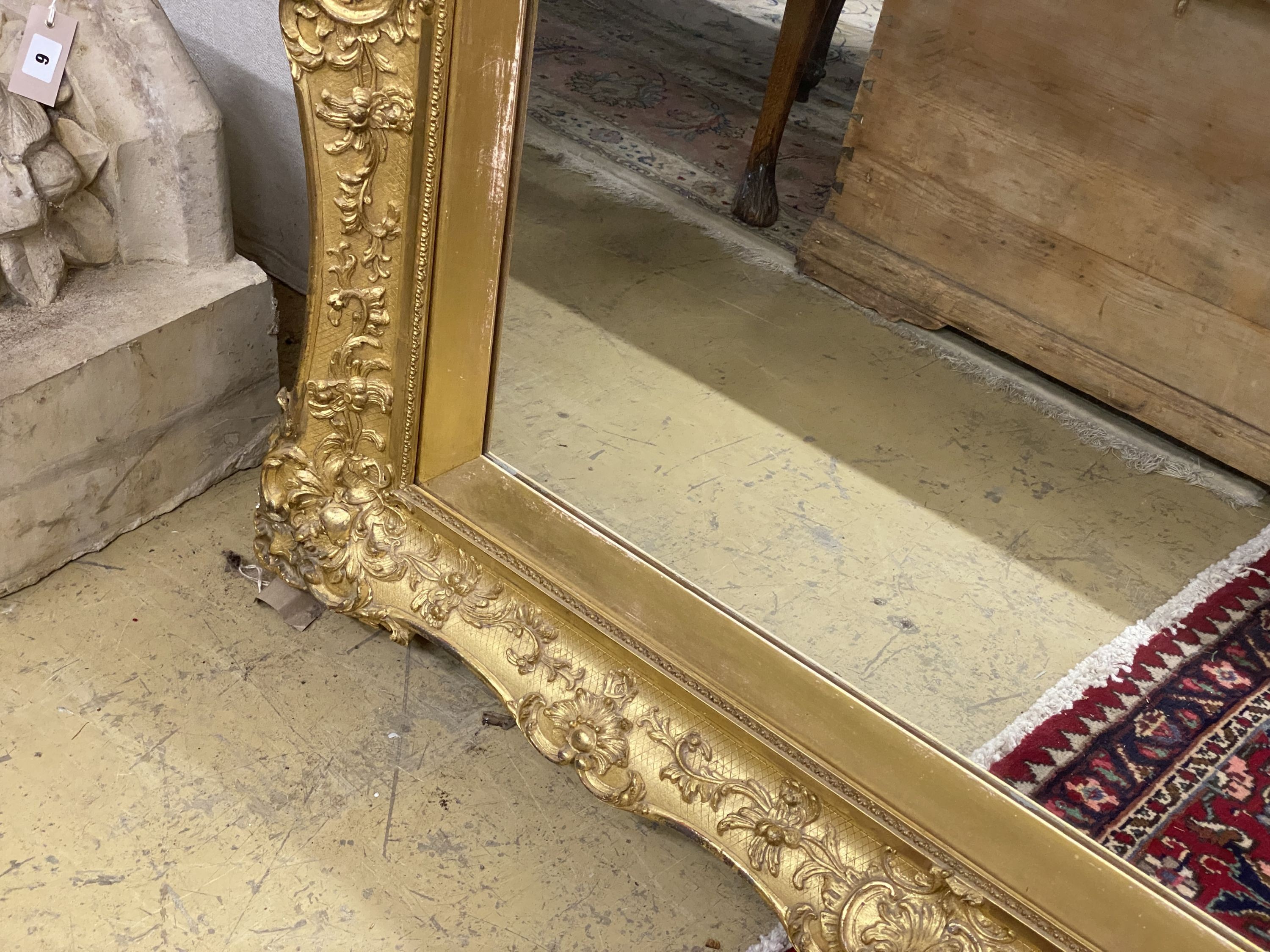 A Victorian giltwood and gesso rectangular wall mirror, width 124cm, height 106cm